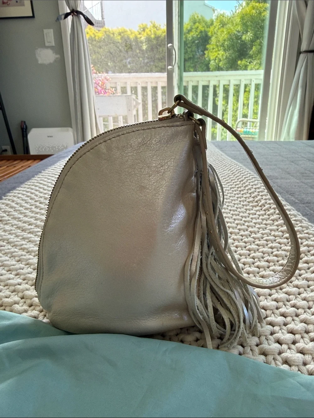 Hobo Pebbled Leather Tassel Wristlet - Silver